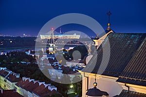 Warsaw, Poland - August 11, 2017: Beautiful aerial panoramic night view of Plac Zamkowy square in Warsaw, with historic building,