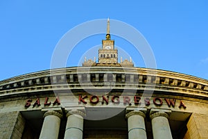 Warsaw, Poland - August 17, 2022: Palace of Culture and Science or PKiN and the Congress Hall or Sala Kongresowa in photo