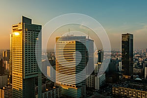 WARSAW, POLAND - DEC. 27, 2017: evening view of the modern business city quarter. sunset over the city. modern skyscrapers. hotel