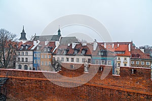 Warsaw, Poland Famous Barbican old town historic capital city during rainy winter day and red orange brick wall fortress