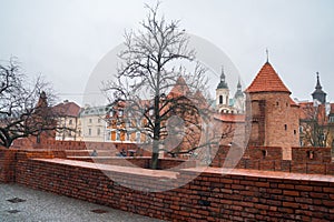 Warsaw, Poland Famous Barbican old town historic capital city during rainy winter day and red orange brick wall fortress