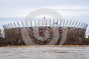 WARSAW, POLAND - FEBRUARY 29, 2020: Exterior of PGE Narodowy, National Stadium in Warsaw city during cloudy weather