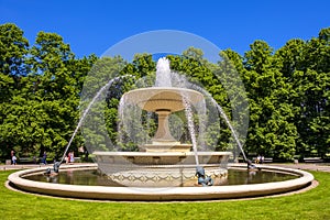 Warsaw, Poland - Historic fountain in the Saxon Garden - Ogrod or Park Saski - oldest public park in Warsaw, next to the Pilsudski