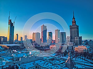 WARSAW, POLAND - JANUARY 31, 2021: Beautiful panoramic aerial drone view on Warsaw City Skyscrapers, PKiN, and Varso Tower under photo