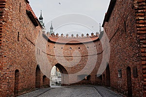 Warsaw, Poland - June 30, 2017: View of the Barbikan gate situated in the Polish city warsaw