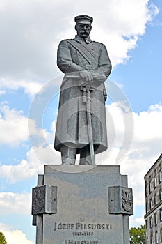 WARSAW, POLAND. A monument to the marshal Jozef Pilsudsky against the background of the skyn photo