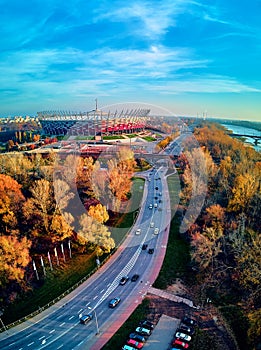 WARSAW, POLAND - NOVEMBER 17, 2019: Beautiful sunset panoramic aerial drone view to panorama of Warsaw modern City with skyscraper