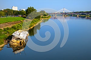 Warsaw, Poland - Panoramic view of Poniatowskiego bridge and Swietokrzyski bridge across the Vistula river contrasting with