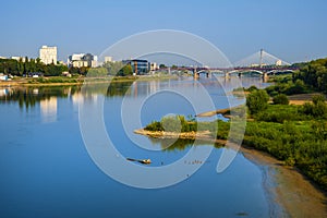 Warsaw, Poland - Panoramic view of the Poniatowskiego bridge and Swietokrzyski bridge across the Vistula river with Warsaw city