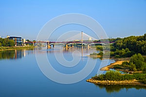 Warsaw, Poland - Panoramic view of the Poniatowskiego bridge and Swietokrzyski bridge across the Vistula river with Warsaw city