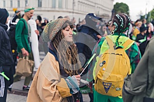 05.28.2022 Warsaw, Poland. Reggae-fashion inspired caucasian young wearing dreadlocks and attending marijuana