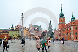 Warsaw, Poland - 02.01.2019: Royal Castle, ancient townhouses and Sigismund`s Column in Old town in Warsaw, Poland. New Year