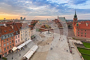 Warsaw, Poland - September 5, 2018: People on the Royal Castle square in Warsaw city at sunset, Poland. Warsaw is the capital and