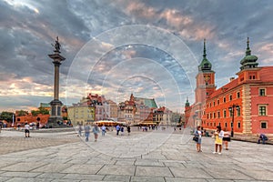 Warsaw, Poland - September 5, 2018: People on the Royal Castle square in Warsaw city at sunset, Poland. Warsaw is the capital and