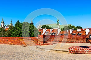 Warsaw, Poland wall of Barbakan and cityscape