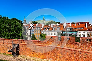 Warsaw, Poland wall of Barbakan and cityscape