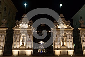 Warsaw University gates at night