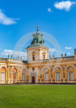 Warszawa, Poland - April 18: Focus on View of the central facade of the Royal Wilanow Palace. Spring in the park