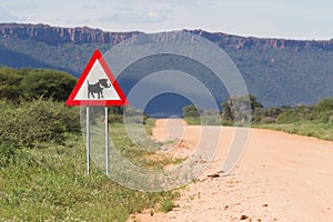 Warthog Road Crossing Sign