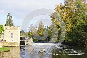 Warwick castle landscape. Weir over River Avon in England