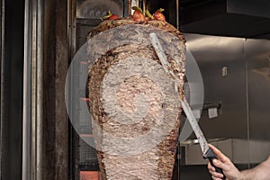It was photographed slashing traditional meat rotary.