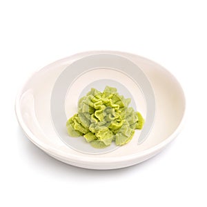 Wasabi in bowl isolated on white background