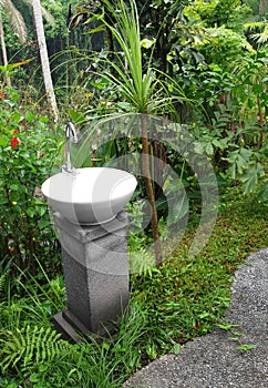 Wash basin with tap, outdoor garden