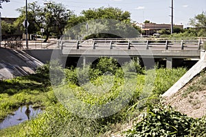 Wash with a Bridge and Reeds in the City of Tucson Arizona