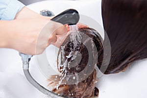 Wash hair of head master before undertaking Spa treatments