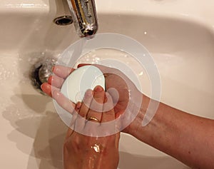Wash hands with soap and water