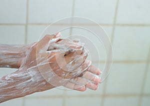 Wash hands with soap and water.