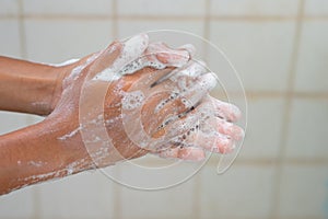 Wash hands with soap and water.