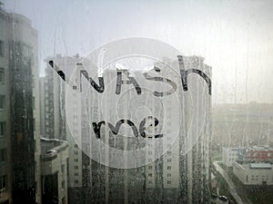 Wash Me Text on Dirty window