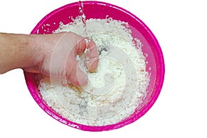 Wash rice with water in the bowl