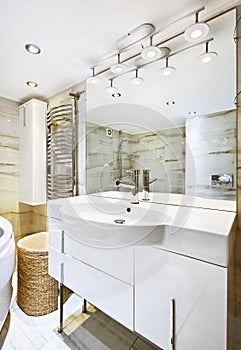 Wash stand with mirror in modern bathroom