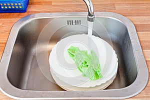 Wash-up by dishcloth