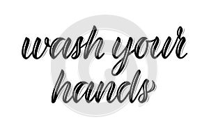 Wash your hands. Calligraphic word on the coronavirus pandemic. Black ink. Vector