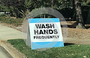 Wash your hands frequently sign