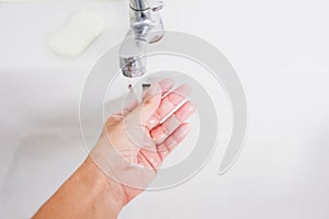 Wash your hands with soap and water to prevent corona virus infe