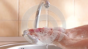 Wash your hands with warm water and soap after a walk, preventing germs or viruses from getting through dirty hands