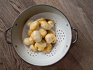 Washed new potatoes in a collander