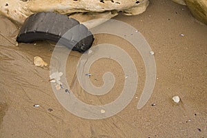 Washed up Tyre on beach