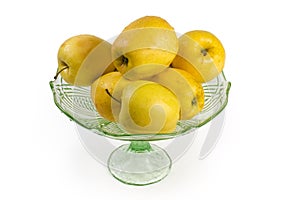 Washed yellow apples in the vintage glass vase for fruits