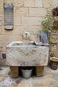 Washhouse with tools.