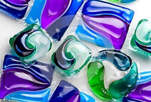 Washing capsules, colorful laundry pods border design. Colorful Soluble capsules with laundry gel