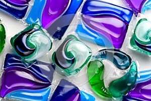 Washing capsules, colorful laundry pods. Colorful Soluble capsules with laundry gel detergent and dishwasher soap