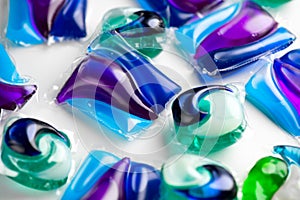 Washing capsules, colorful laundry pods. Colorful Soluble capsules with laundry gel detergent and dishwasher soap