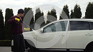 Washing car, car washing process with karcher and soap.