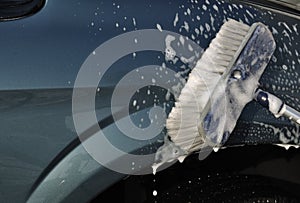 Washing Car with Scrub Brush