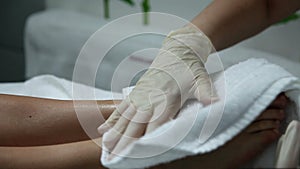 Washing feet in spa salon